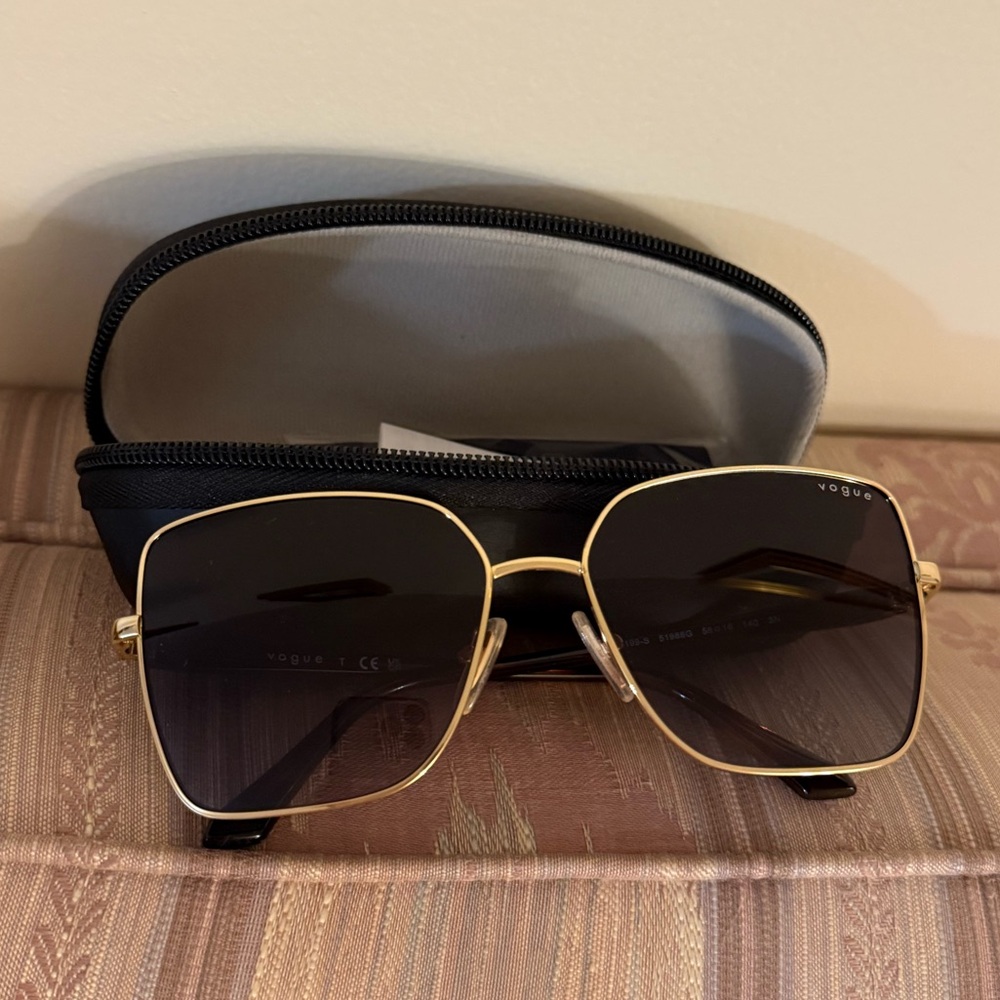 Vogue Elegant Gold and Black Eyewear